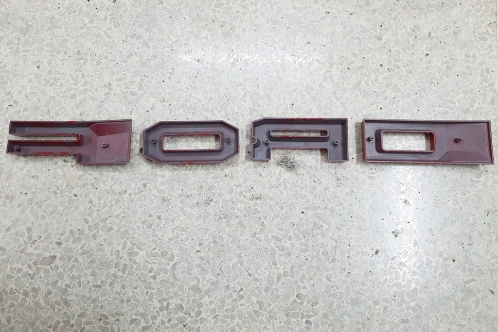 FORD RANGER 

GRILL LETTERS

   'F-O-R-D'

RED/BLACK  LETTERS