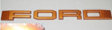 FORD RANGER 

GRILL LETTERS

   'F-O-R-D'

ORANGE LETTERS