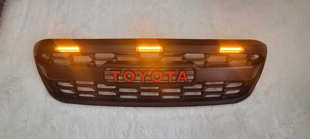 TOYOTA HILUX  FULL GRILL 2005-2012  MK7 RED LOGO AMBER LED'S