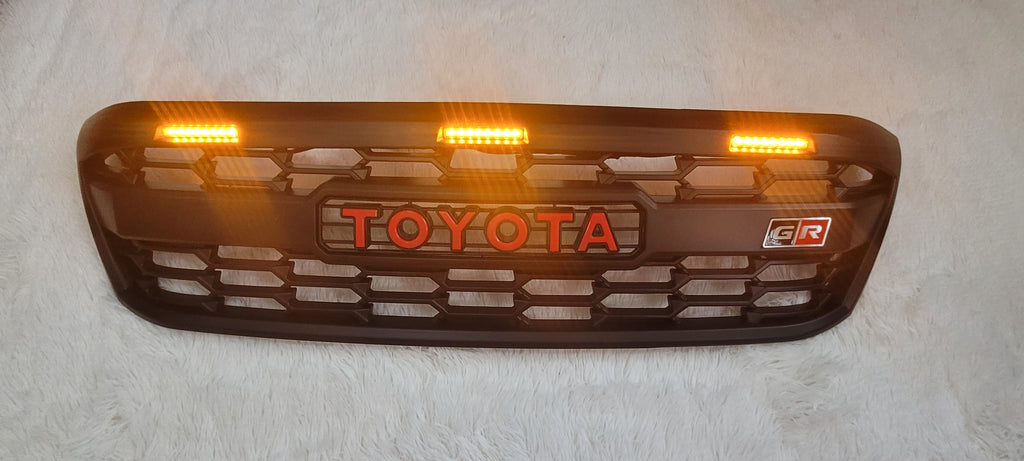 TOYOTA HILUX  FULL GRILL 2005-2012  MK7 RED LOGO AMBER LED'S