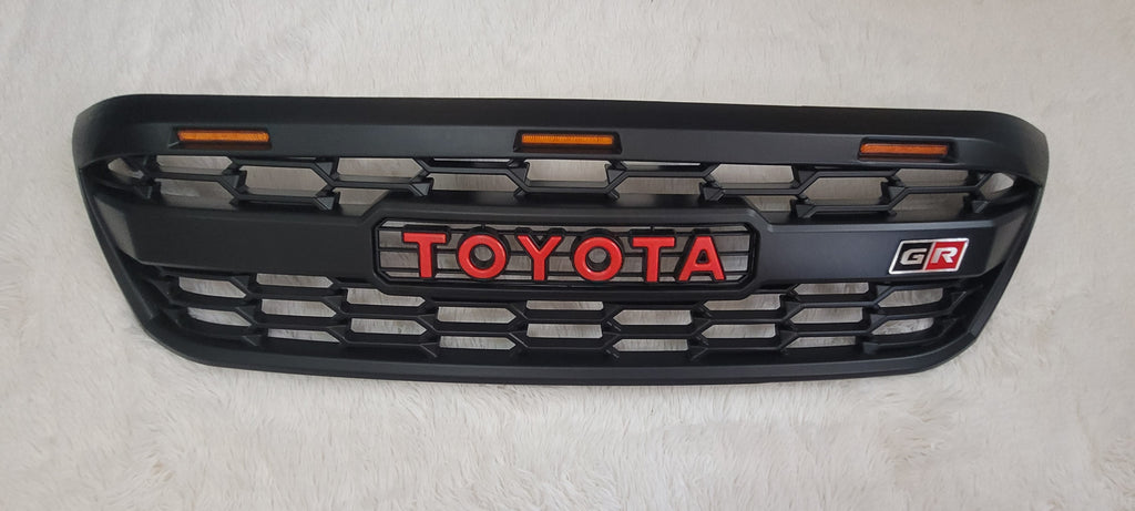 TOYOTA HILUX  FULL GRILL 2005-2012  MK7 RED LOGO AMBER LED'S