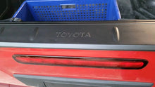 Load image into Gallery viewer, TOYOTA HILUX GENUINE TAILGATE PROTECTOR TRIM 2015-2024