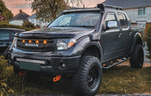 Load image into Gallery viewer, NISSAN NAVARA
D40 PRE-FACELIFT

FULL GRILL REPLACEMENT

WHITE LOGO
MATT BLACK VERSION! 

/PATHFINDER R51 AMBER LEDS