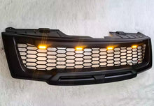 Load image into Gallery viewer, NISSAN NAVARA D40 FACELIFT COMPLETE GRILL(WITH NISMO LOGO) AMBER LEDS 2010-2015